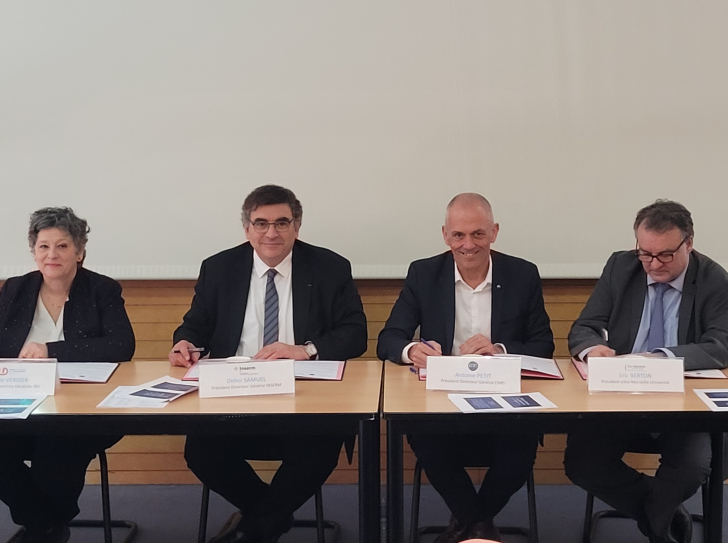 Representatives from Aix-Marseille University, CNRS, Inserm and IRD officially mark the birth of MER